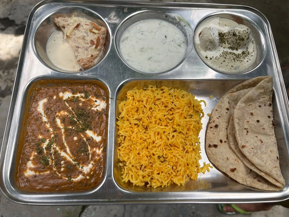 A sattvic thali with dal, rice, curd and chapati at Tattvaa Yogashala