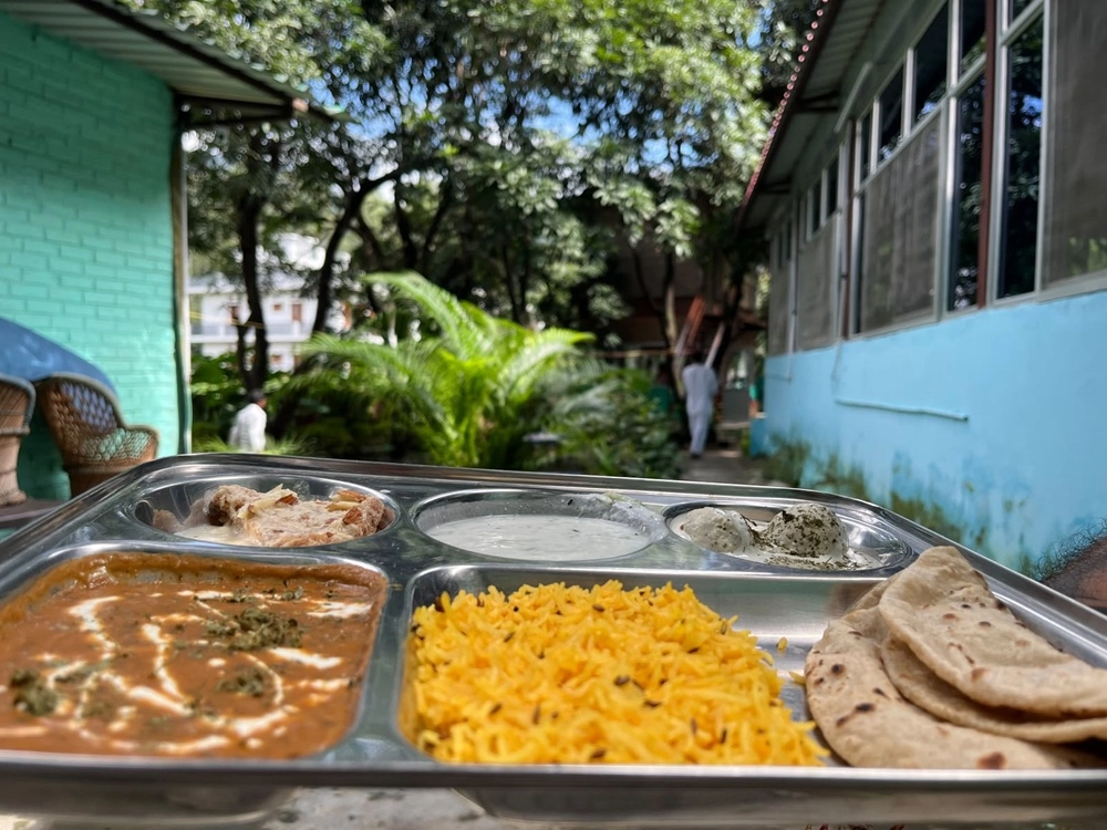 A sattvic thali served in the ashram garden at Tattvaa Yogashala
