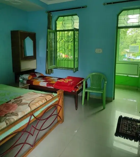 A room at Krishna Cottage at Tattvaa Yogashala, Rishikesh