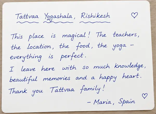 Handwritten note from Maria, Spain — This place is magical! The teachers, the location, the food, the yoga — everything is perfect. I leave here with so much knowledge, beautiful memories and a happy heart. Thank you Tattvaa family!
