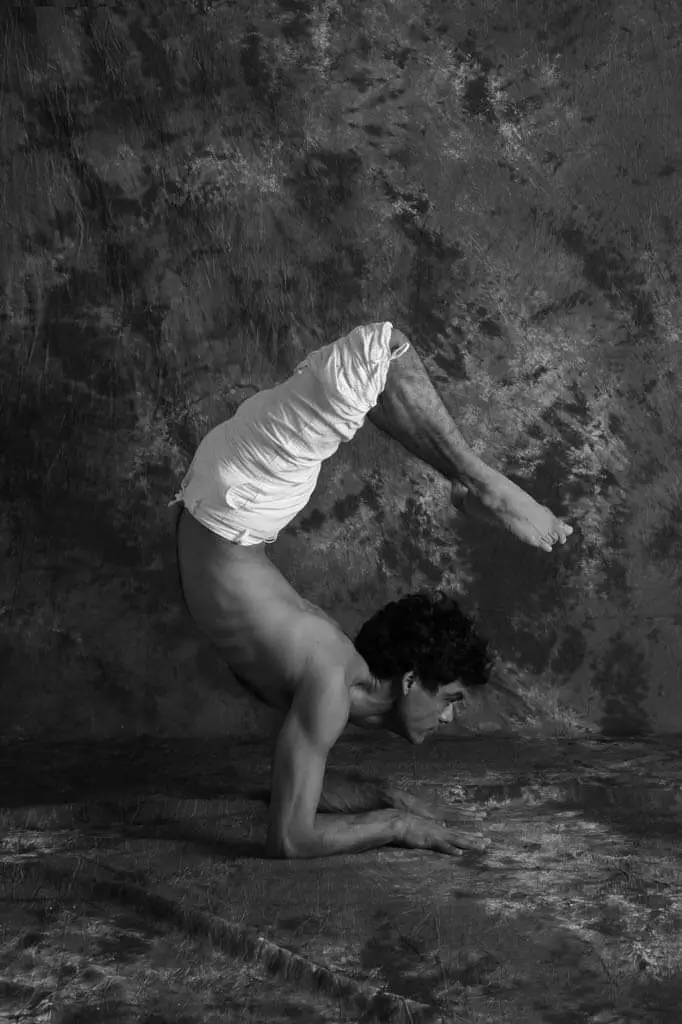 A student holding an elbow balance during the 300 hour Ashtanga yoga teacher training at Tattvaa Yogashala, Rishikesh